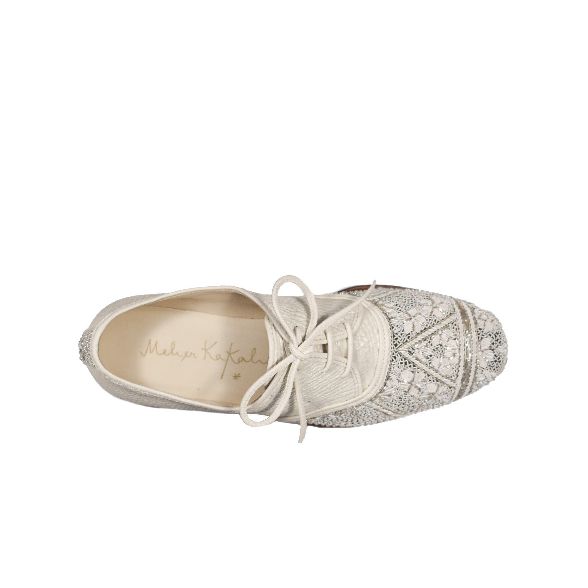 Comfortable wedding shoes by Meher Kakalia, handmade with dapka embroidery, ideal for brides seeking luxurious bridal flats.