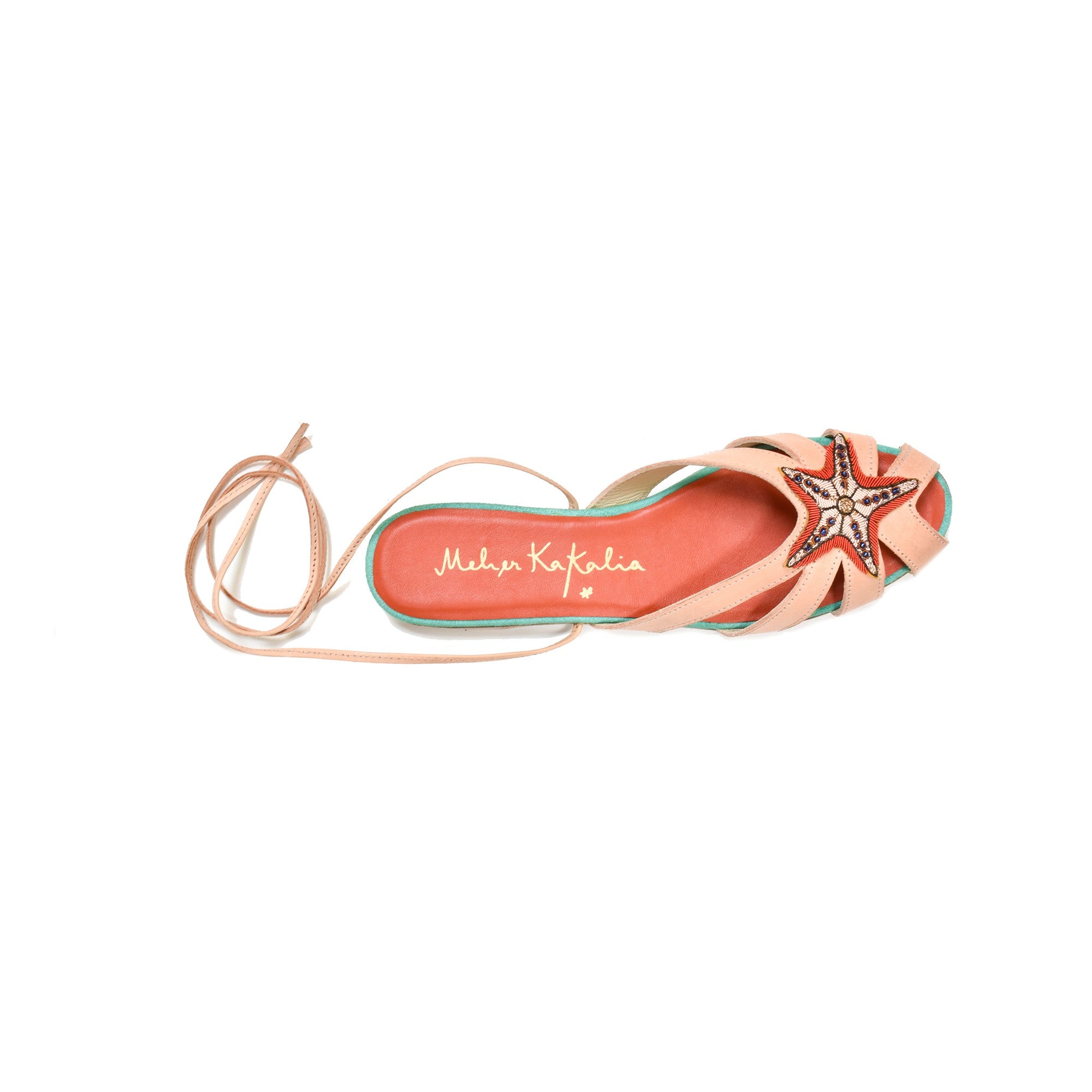 Top-down view of Meher Kakalia handcrafted sandals, highlighting the elegant embroidery and lightweight feel.