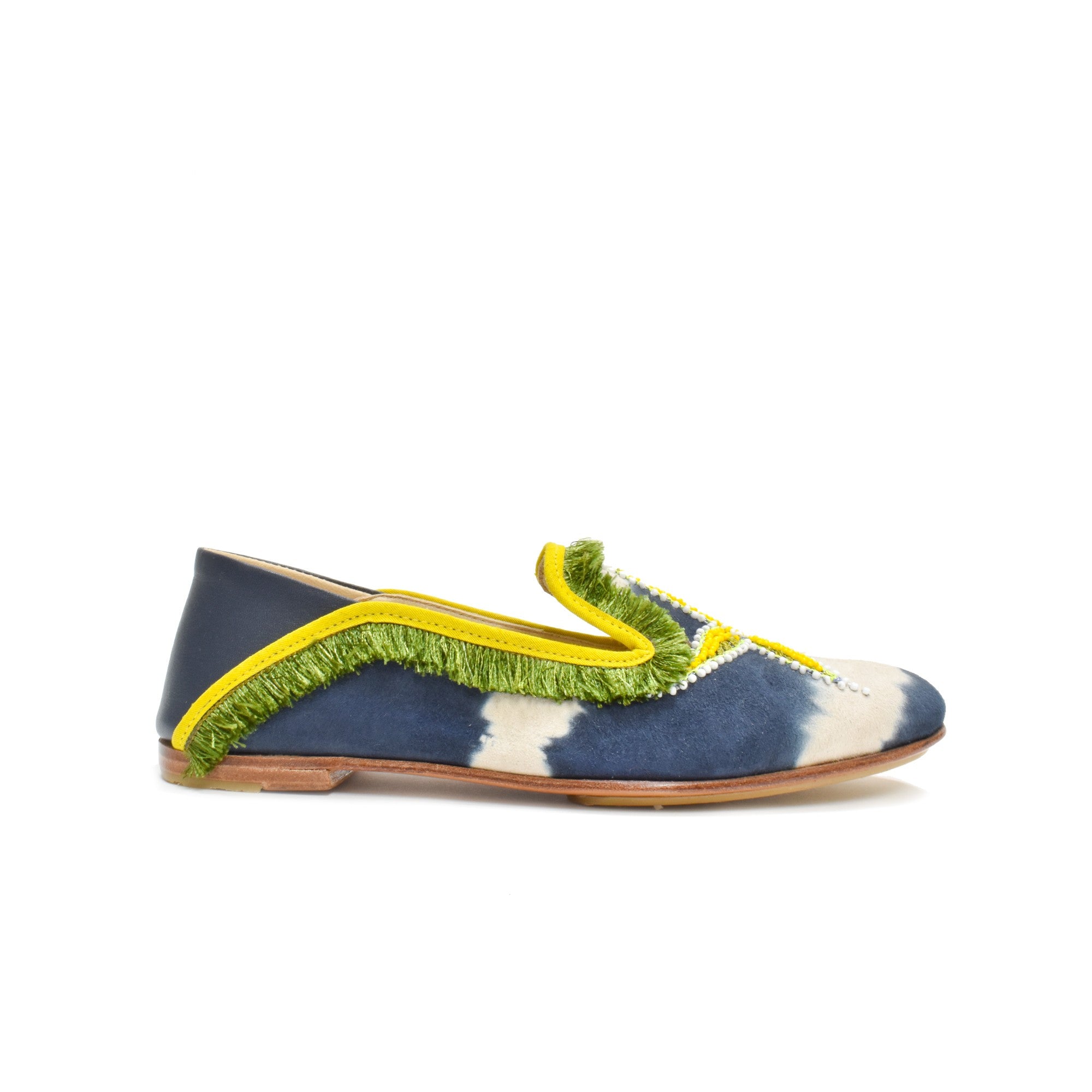 Comfortable and versatile Mazu Moccasins, hand-embroidered with starfish, perfect for travel and summer outings.