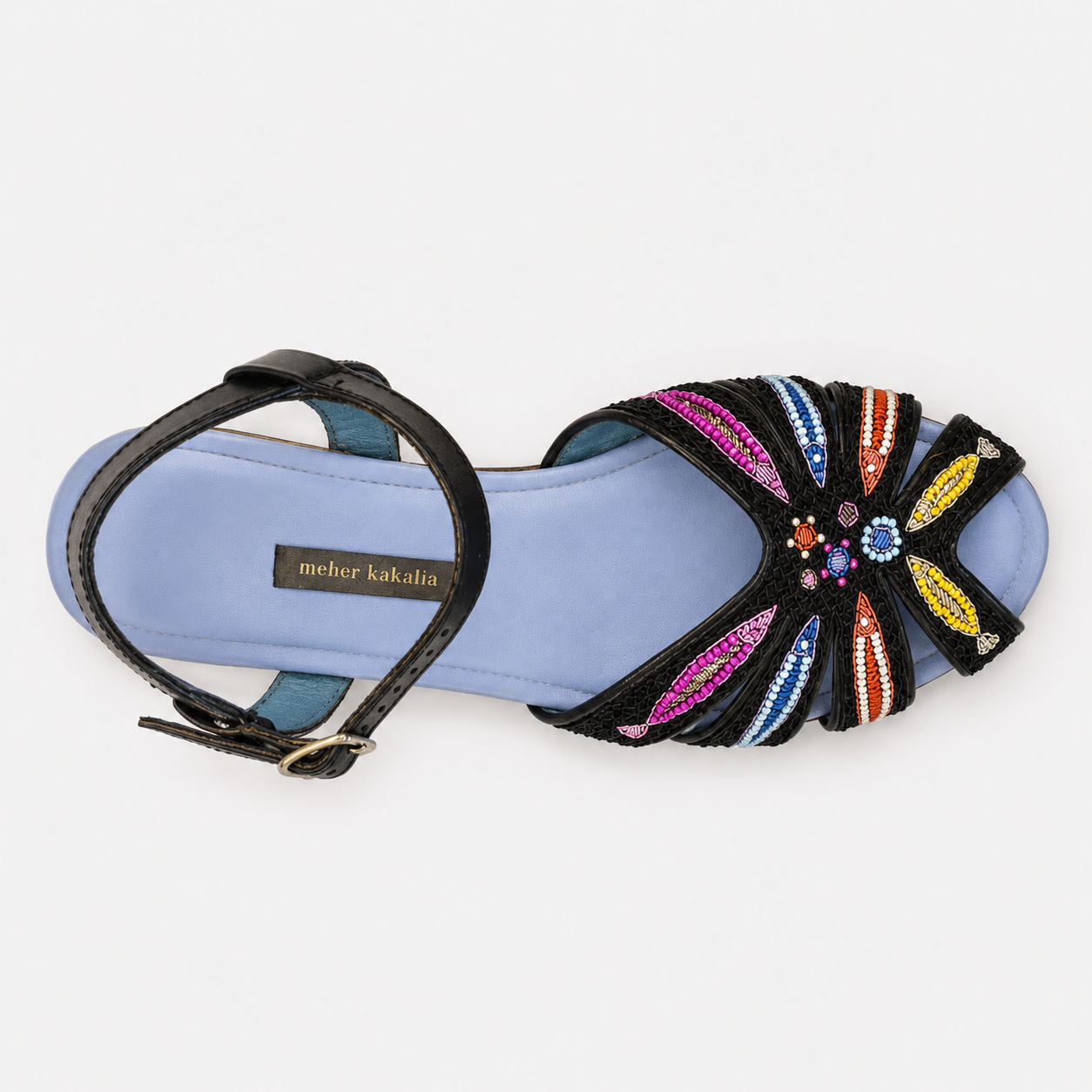 Colorful embellished sandal with 'meher kakalia' branding on a white background